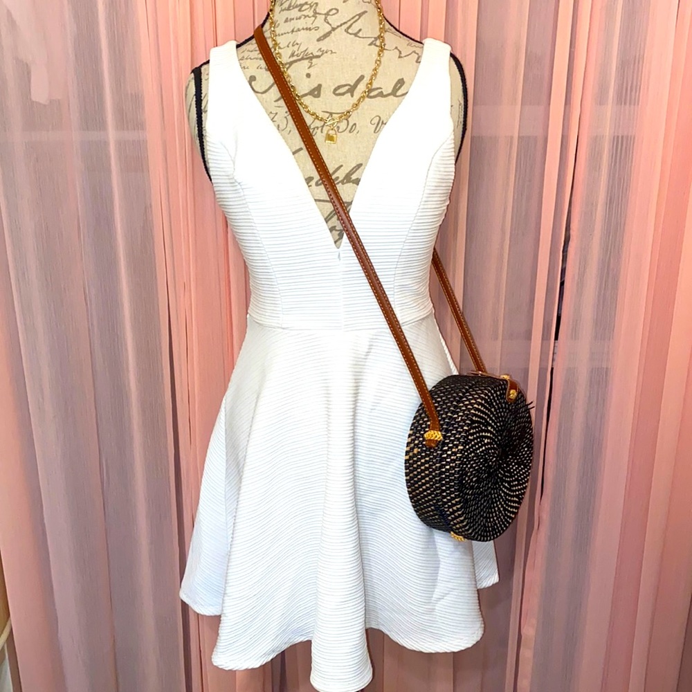 Little white dress. Low cut can be worn w/ bandeau